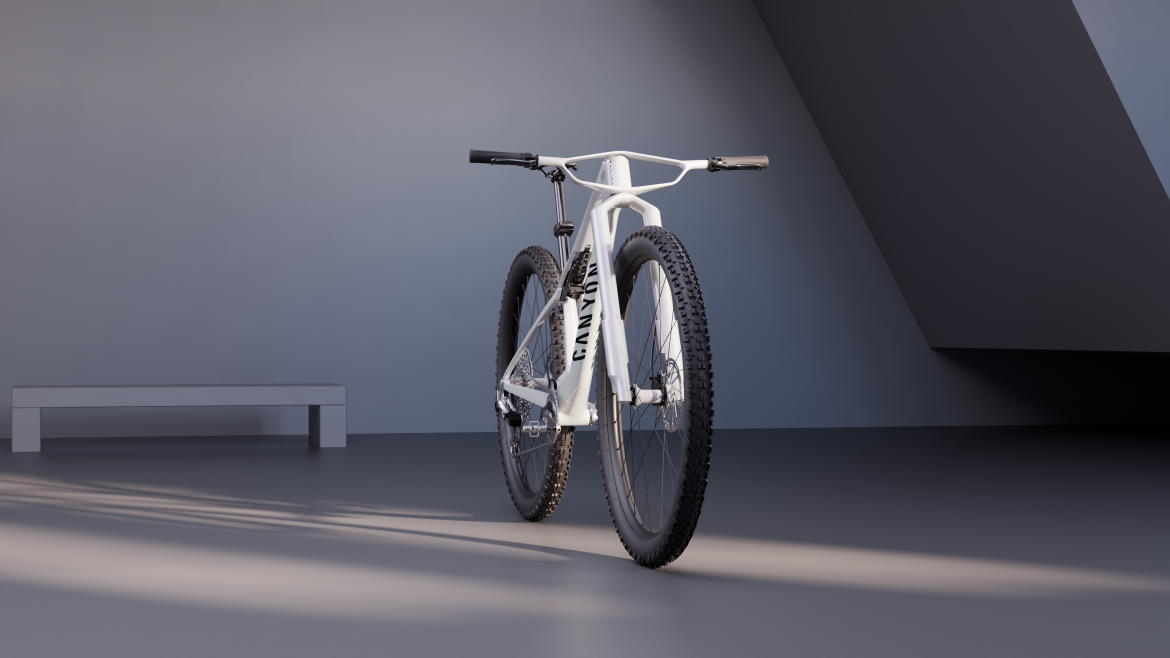 A stylish white mountain bike is positioned in a minimalist indoor setting, showcasing its sleek design. The bike features wide, textured tires and a simple handlebar design, with dramatic lighting casting shadows on a smooth gray surface. A bench is visible in the background, adding to the modern aesthetic.