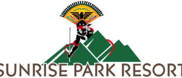 Logo of Sunrise Park Resort featuring stylized mountains, a colorful emblem with a bird, and a figure dressed in ninja attire climbing. The text "SUNRISE PARK RESORT" is displayed prominently below.