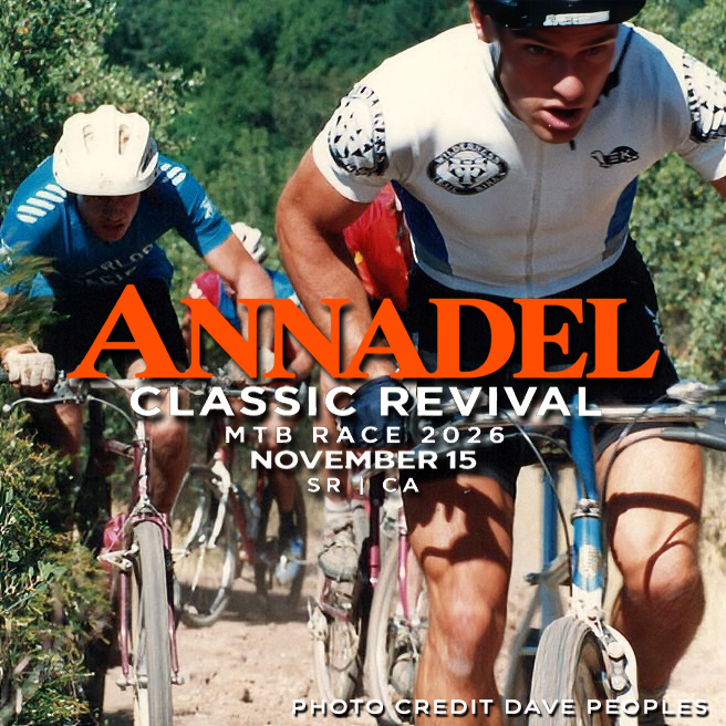 A vibrant scene of mountain bikers competing in the Annadel Classic Revival race, set in a lush, green landscape. The image features several cyclists in motion, showcasing their racing gear and bikes on a rugged trail. The event is highlighted with the text "Annadel Classic Revival," with details of the race date, November 15, 2026, in Santa Rosa, California, along with a photo credit to Dave Peoples.