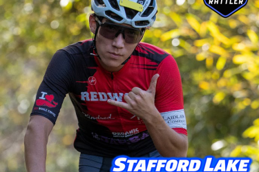 A cyclist dressed in a red and black jersey giving a thumbs-up sign, wearing sunglasses and a helmet, on a trail surrounded by greenery. Text overlay includes "November 8, 2026" and "Stafford Lake Rattler XC + Juniors Fundraiser."
